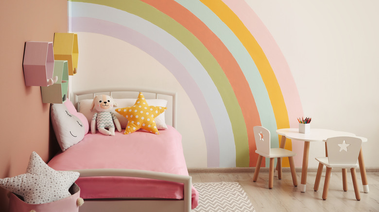rainbow mural in kids bedroom