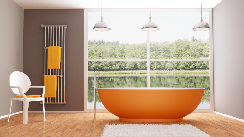 orange tub in bathroom 