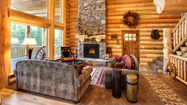 wooden walls with stone fireplace