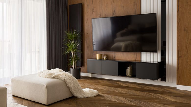 wooden wall behind television