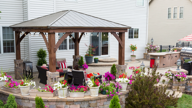 wooden gazebo with aluminum roof