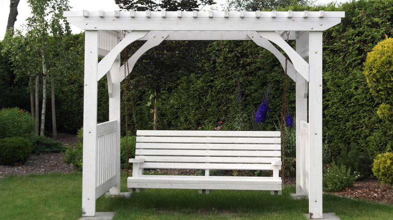 white swing and gazebo