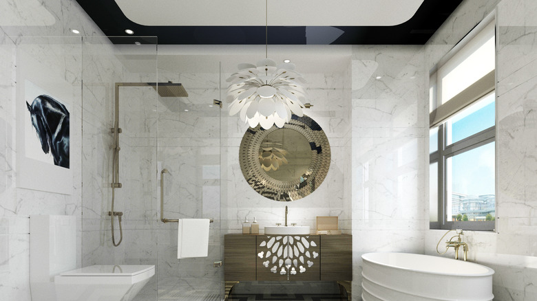 bathroom with chandelier 