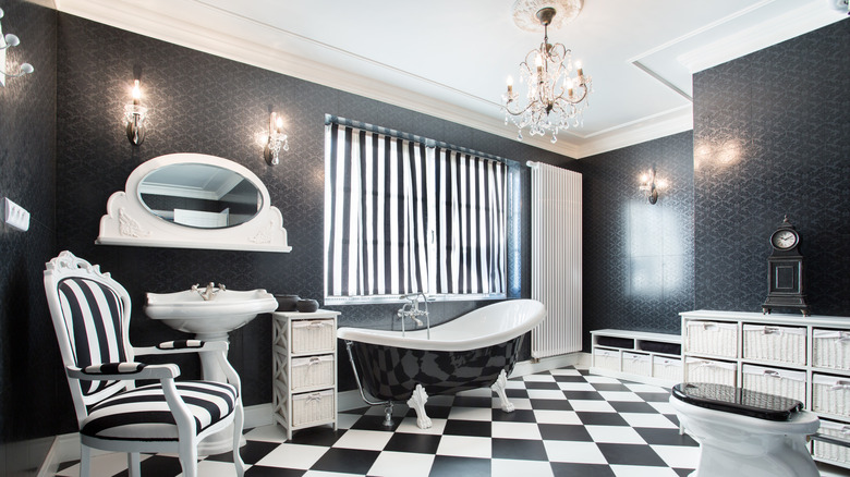 checkered bathroom with chandelier 