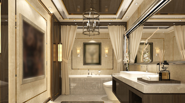 cream-colored bathroom with chandelier