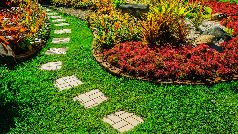 small stones in grassy garden