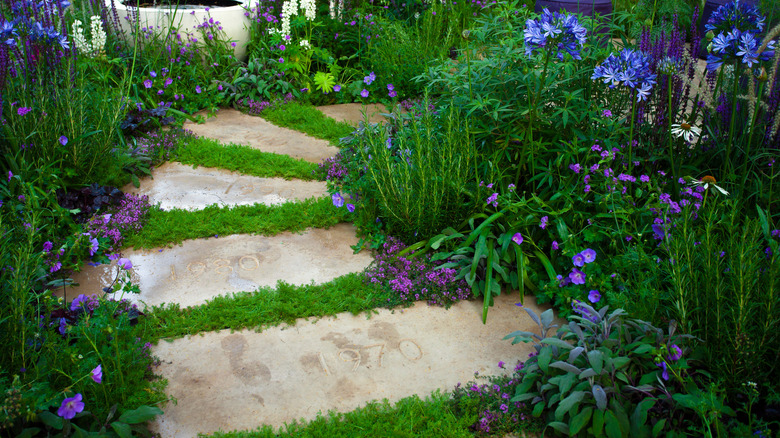 long stones surrounded by greenery