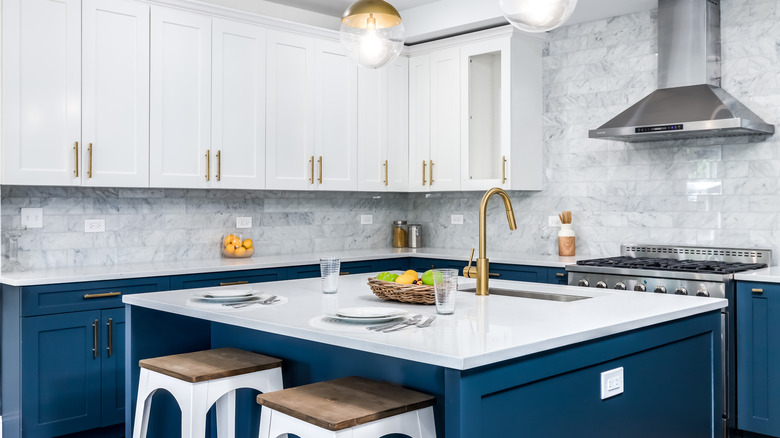 Blue, white, and gold kitchen