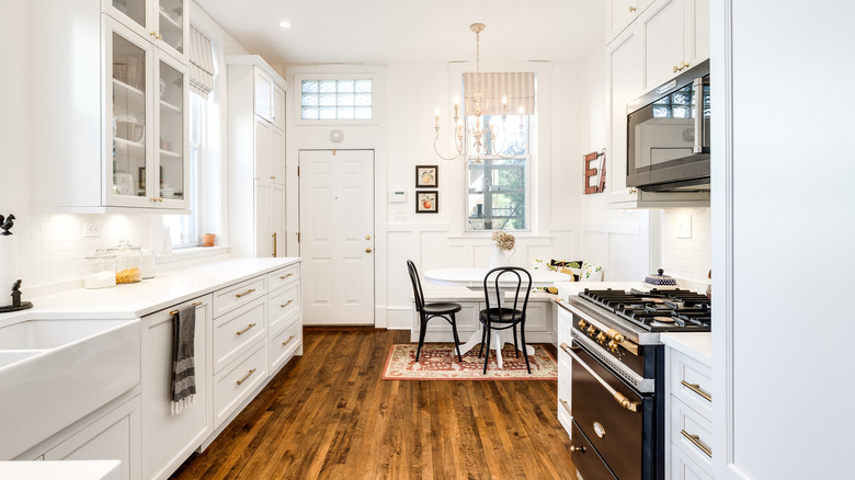 Gold chandelier kitchen dining room