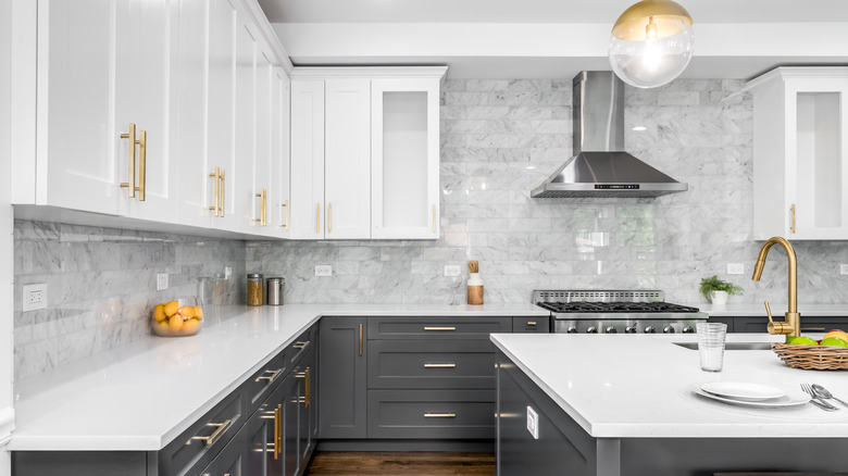 Gray, white, and gold kitchen