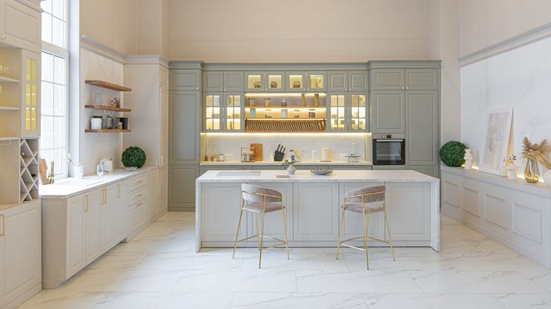 Sage green, white, gold kitchen