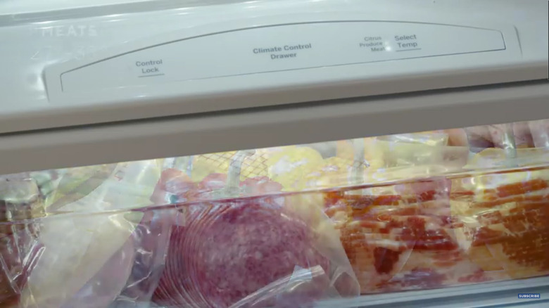 stocked fridge with climate control drawers