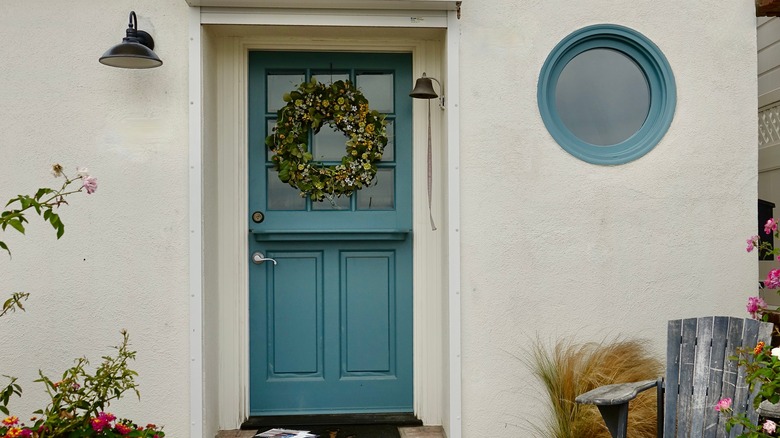 door with floral wreath