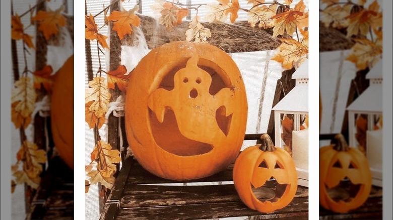 Carved out ghost on pumpkin