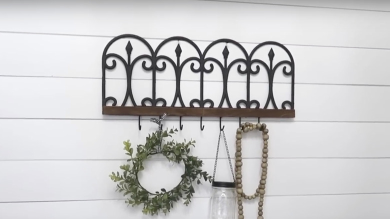 A wall hook made from garden fences from Dollar Tree