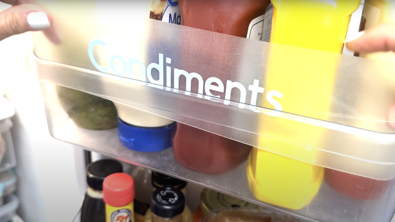 Fridge shelf labels made from Dollar Tree chopping mats.