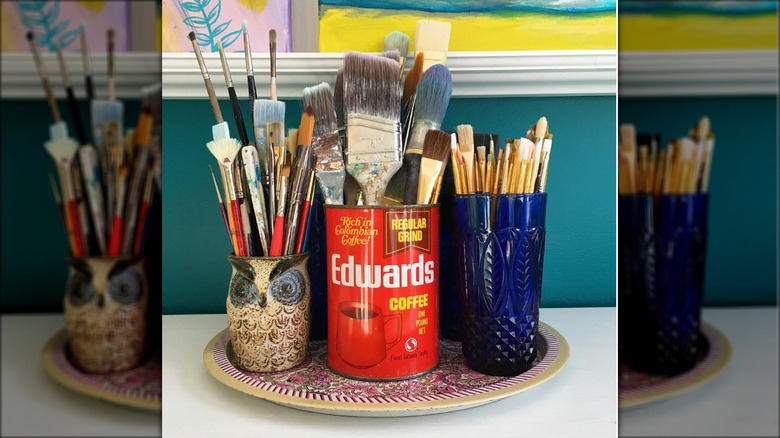 paint brushes in coffee can