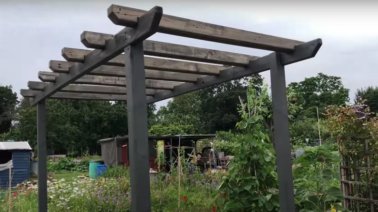 wooden pergola in garden