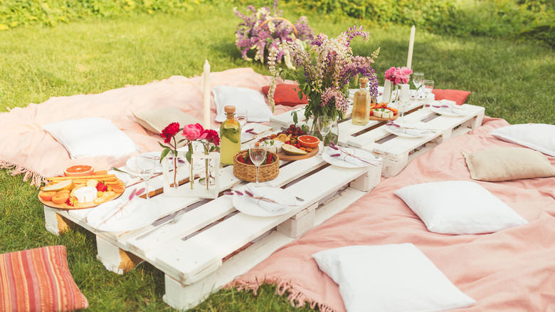 white pallets used as tables