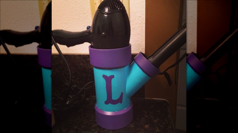 teal and purple hair tool holder