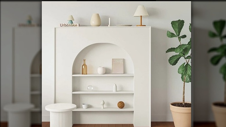 faux white fireplace with shelves