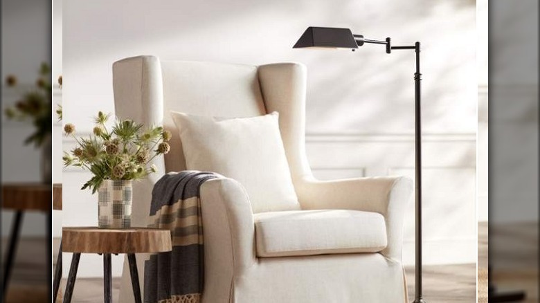 reading lamp with white chair