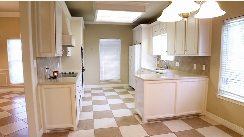 White kitchen with checkered floors