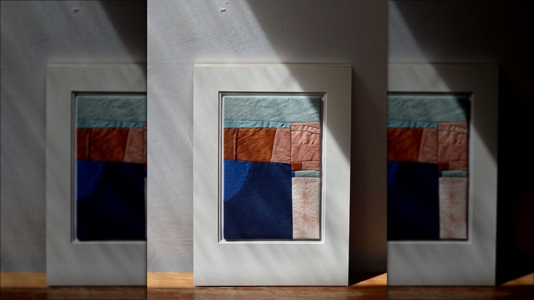 fabric collage in frame