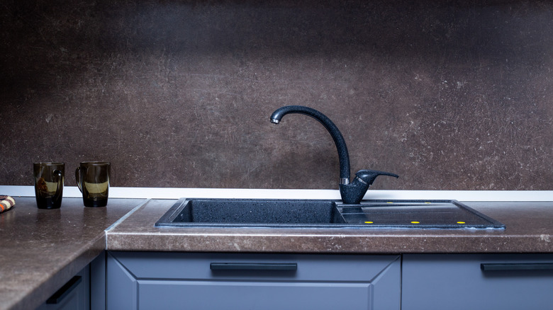 Blue sink basin and faucet