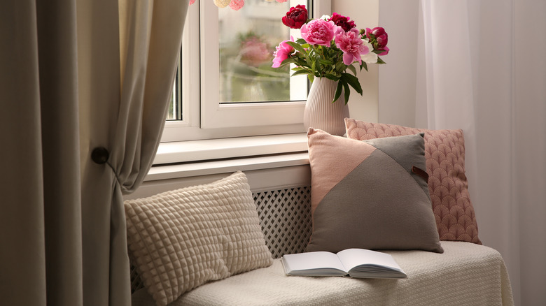 Elegant window bench with flowers