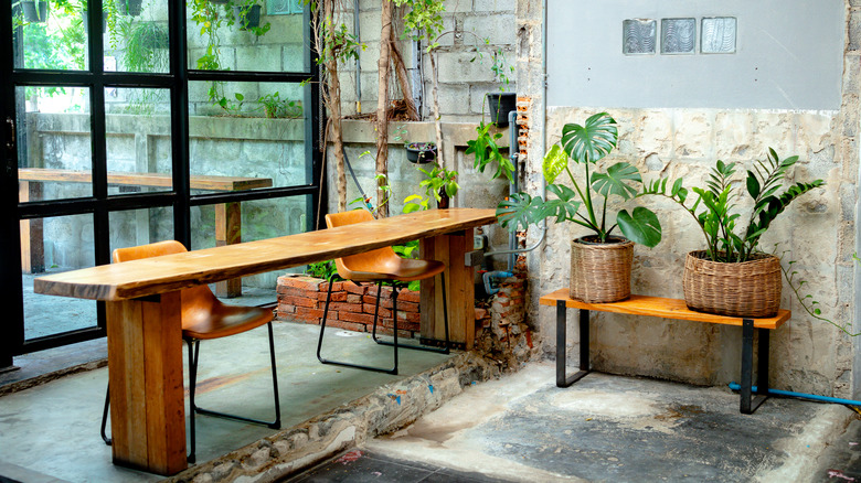 Wooden coffee bar table with plants