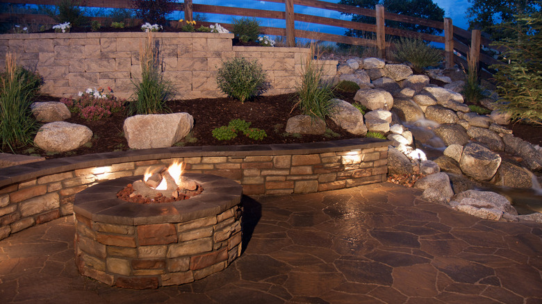 lighting around stone fire pit