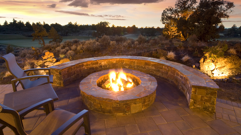 stone fire pit with bench