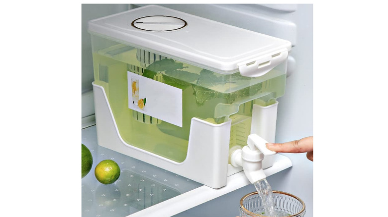 large drink dispenser in fridge