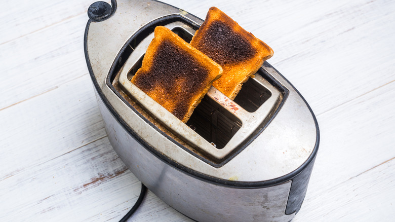 toaster with burnt bread