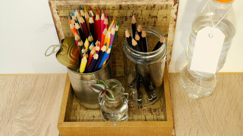 colored pencils in metal tin