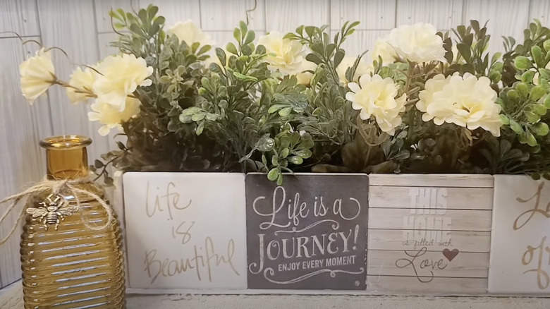 A planter with walls made from old coasters