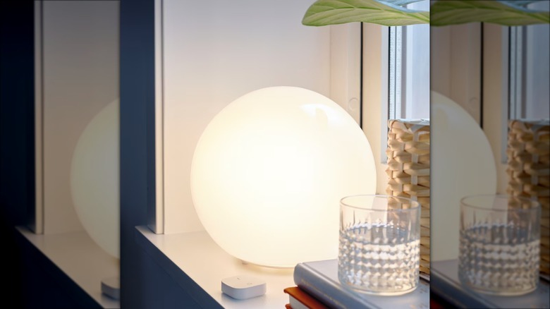 round table lamp on windowsill