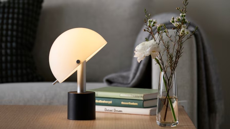 rounded portable lamp on table