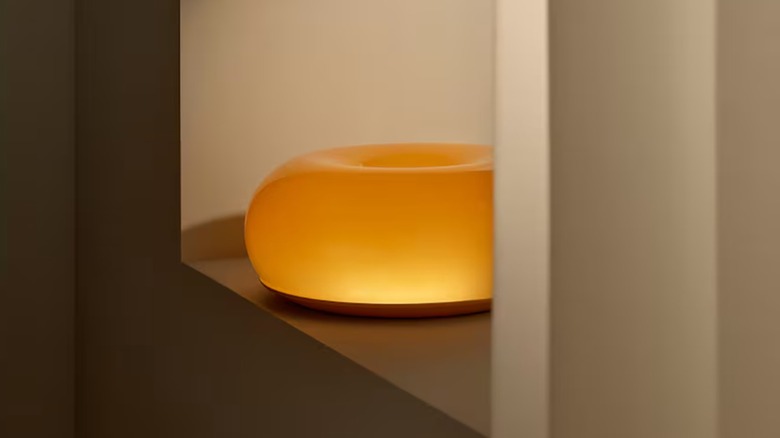 donut shaped orange lamp