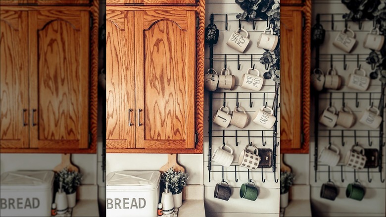 mugs hanging on kitchen wall