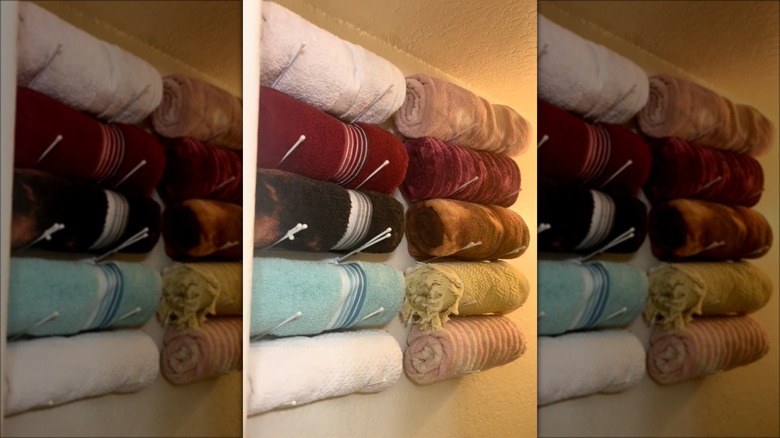 multicolored towels hanging on wall