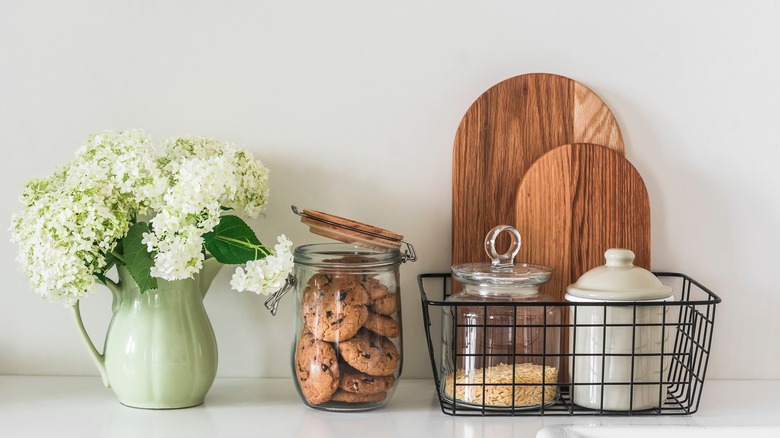 glass and ceramic jars on counter