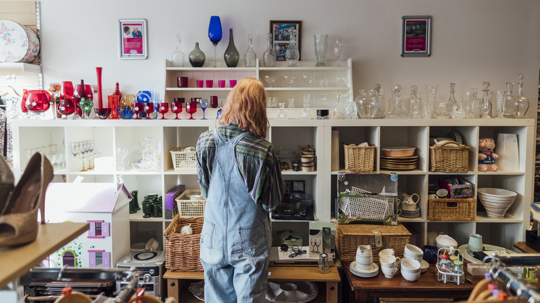 woman shopping in thrift store