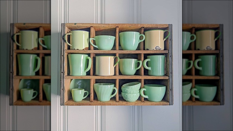 green cups in crate shelf