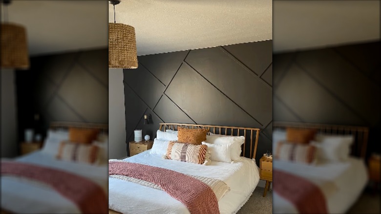 bedroom with geometric wall patterns