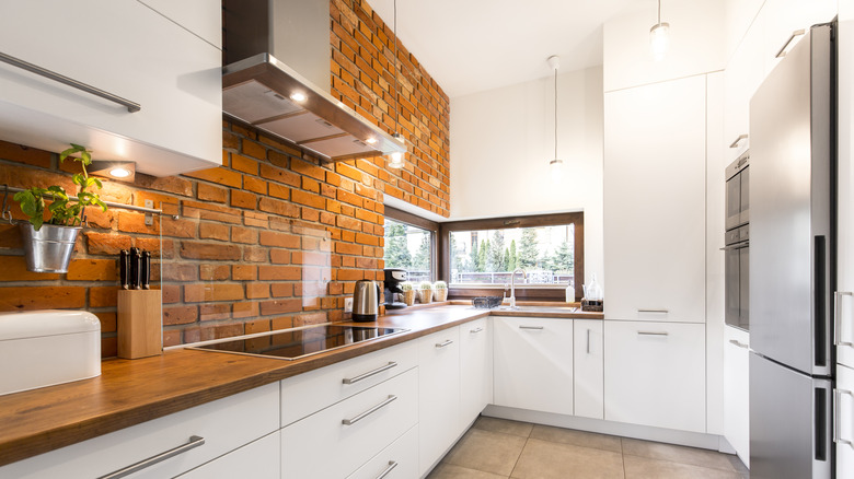 Bright red brick backsplash