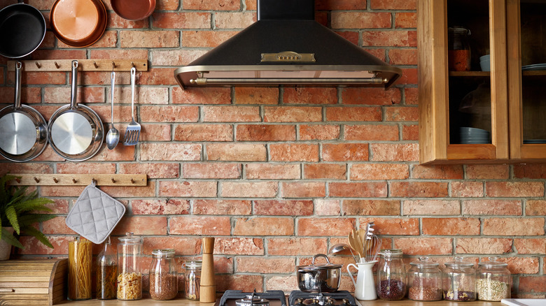 Warm rustic kitchen brick backsplash