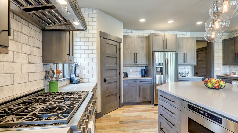 Weathered white wash brick backsplash