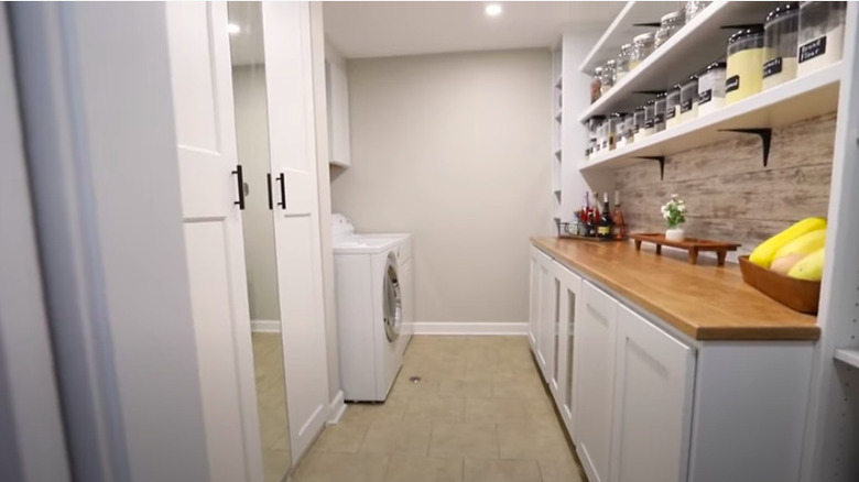 White and organized laundry room